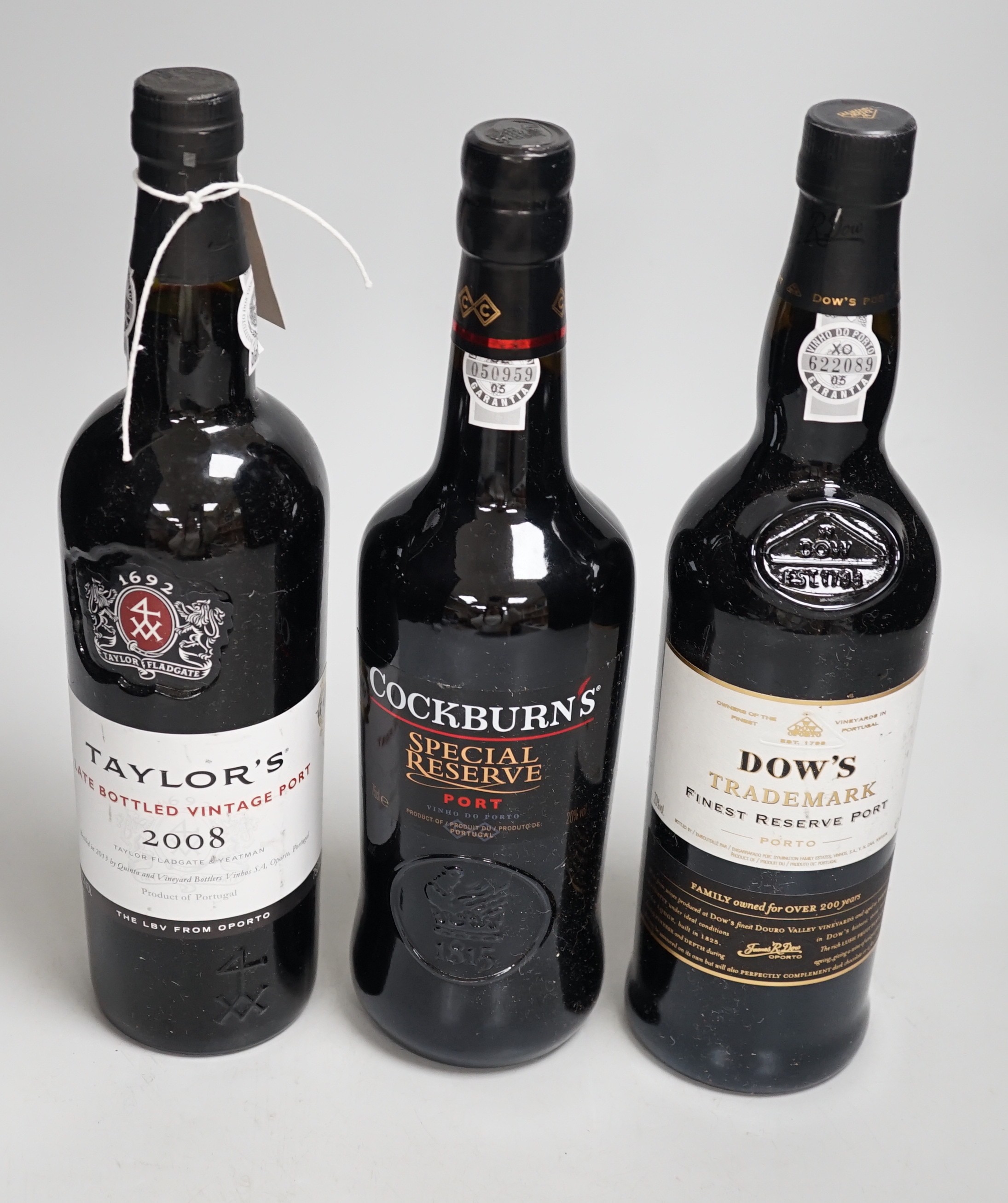 Three bottles of 750ml port, to include Taylor’s, Cockburn’s, Dow’s